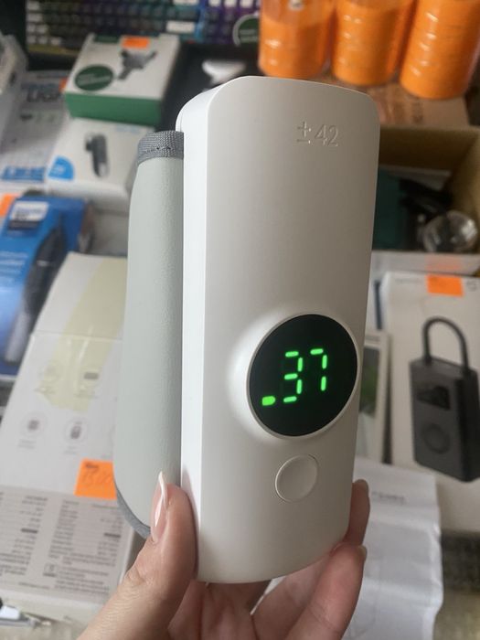 портативний підігрівач для дитячих пляшечок.