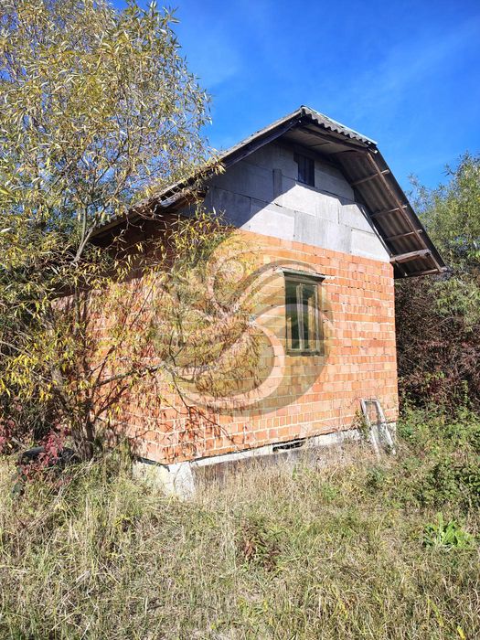 Ділянка в с.Чукалівка 16 сот з недобудовою