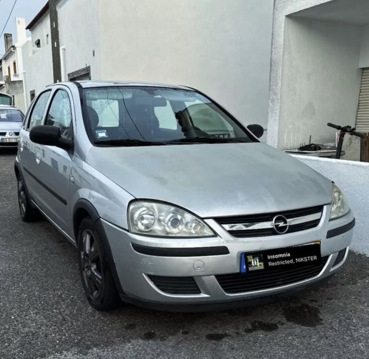 Troco opel corsa 1.3 CDTI 70cv,troco por carrinha de caixa aberta em bom estado ou jipe