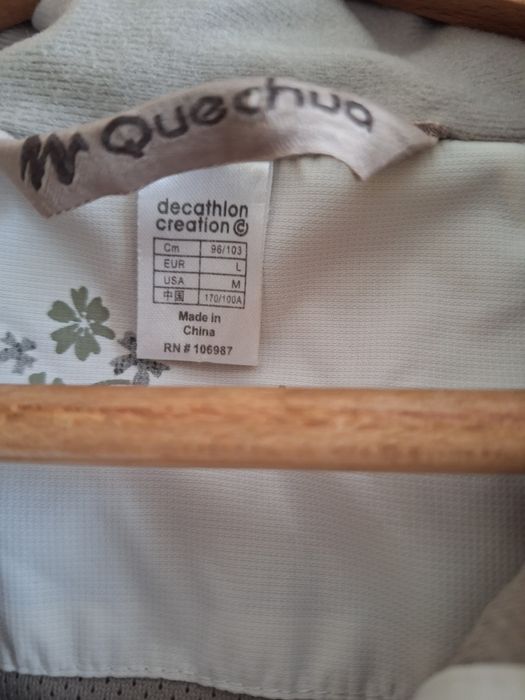 Kurtka sportową damską decathlon.