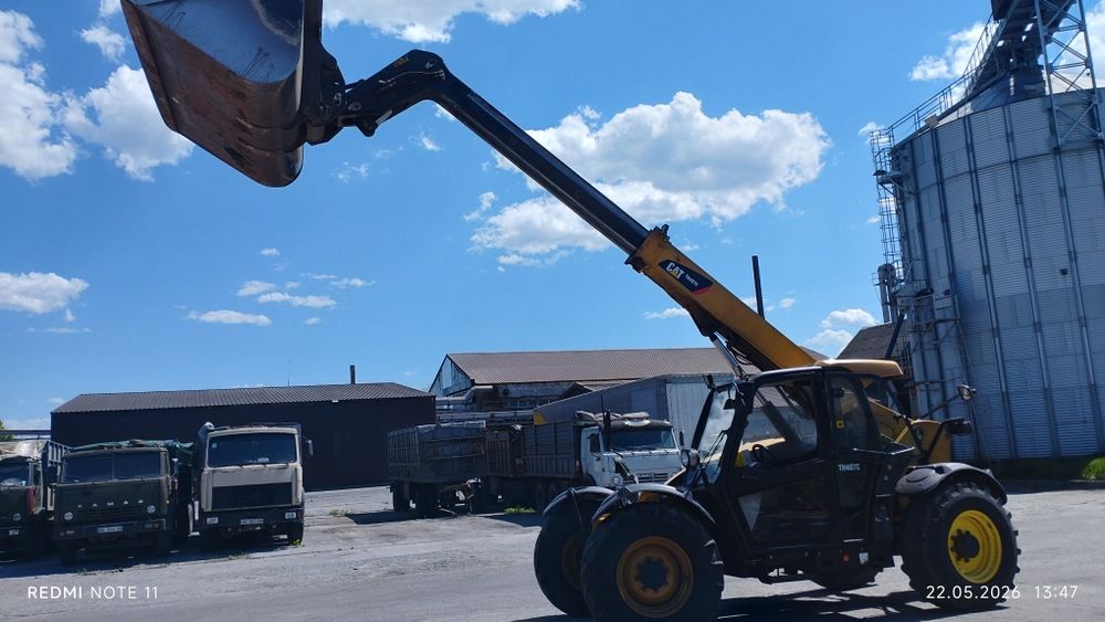 Продам телескопический погрузчик cat 407 c