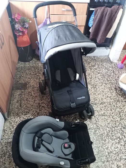 Carrinho de bebê com ovo como novo