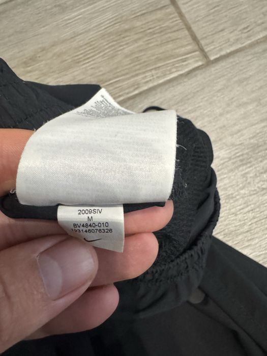 Штани Nike на молнии снизу