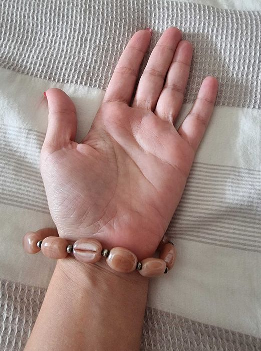 Pulseira em tons damasco/ castanho claro