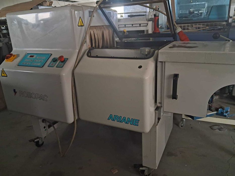 Máquina de embalar retrátil