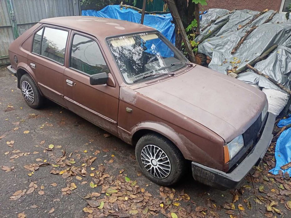 Opel Kadett Опель Кадет хэчбэк 1.2