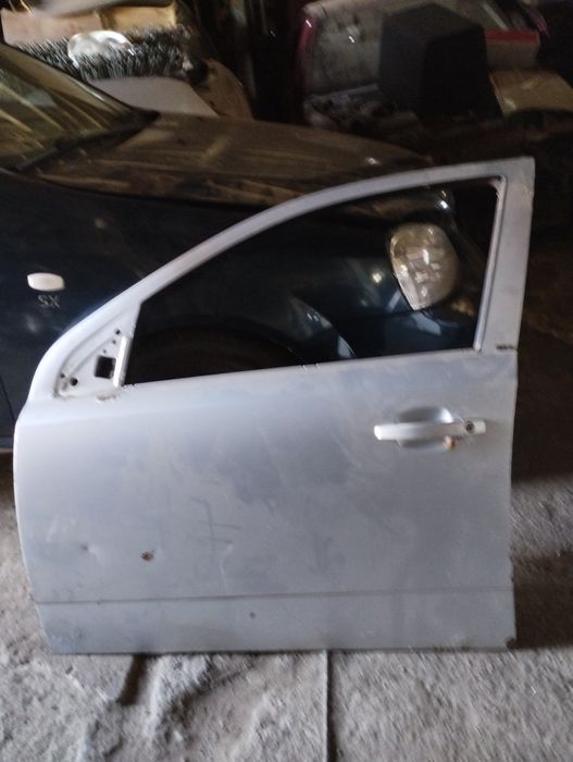 Двери Опель астра  H G калибра кадет део ланос