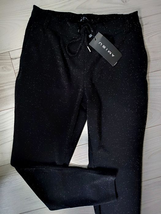 Nowe spodnie srebrna nitka 36/38