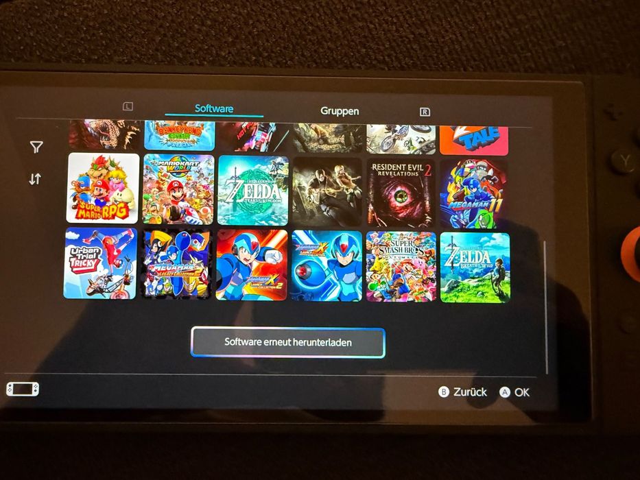 Nintendo Switch V2 incluindo 7 jogos + conta com vários jogos