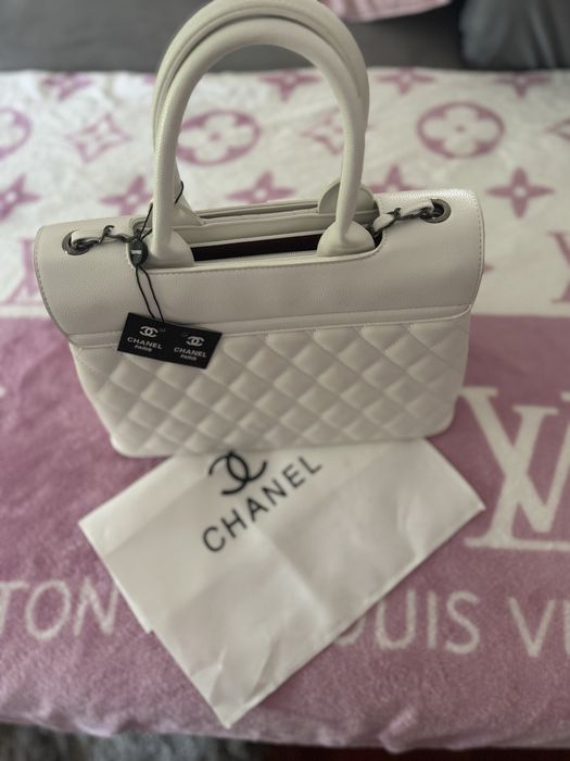 Mala chanel pele caviar branco