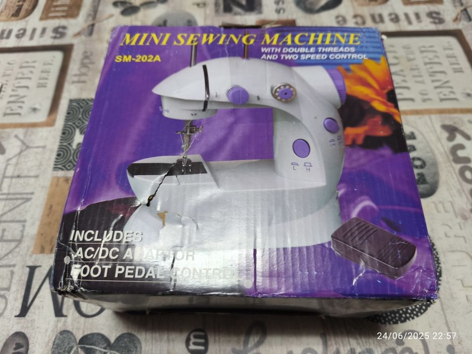 Maquina de costura portátil