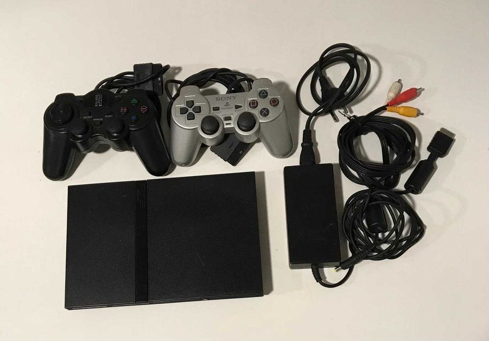 Playstation 2 + Comandos e Jogos