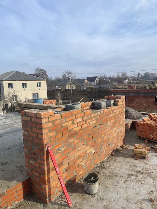 Кирпичьная кладка кровельние роботи