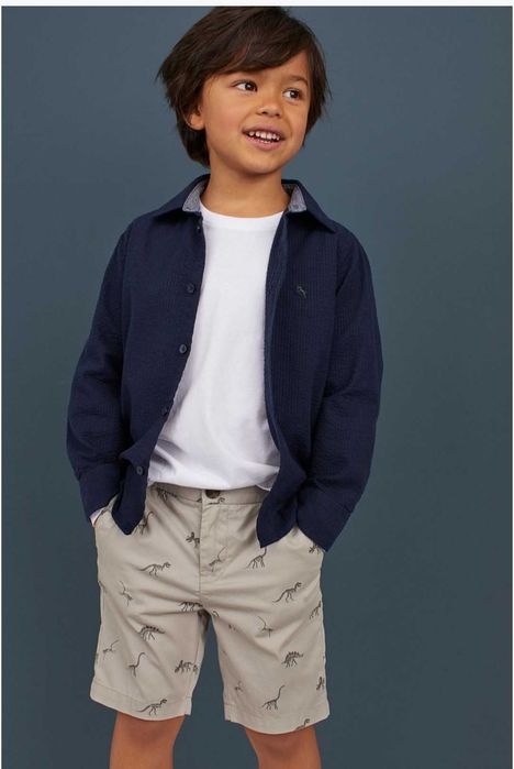 Calções/bermudas menino chino bege estampado dinossauros "H&M"