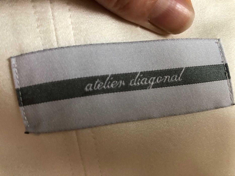Suknia ślubna - Atelier Diagonal 1843- falbany- podpinany tren