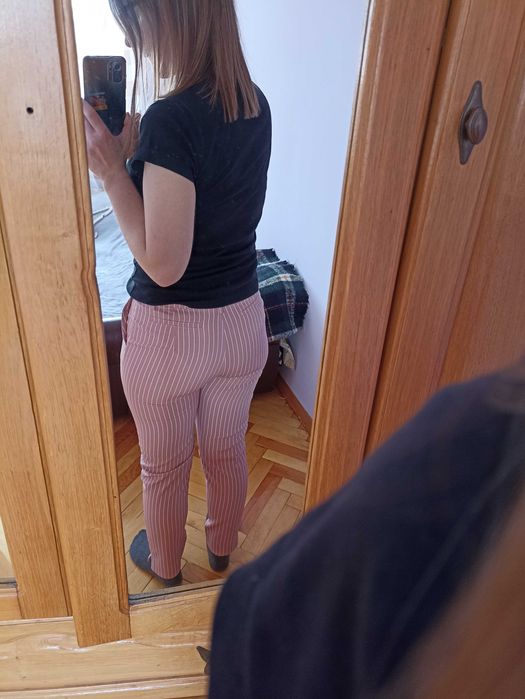 Штани ніжно- рожевого кольору в дрібну білу полоску