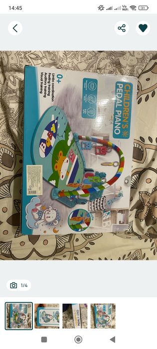 Музичний розвиваючий килимок.