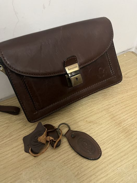 Bolsa de mão homem em pele