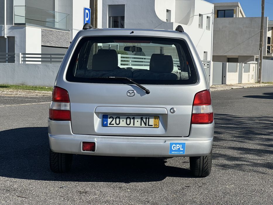 Mazda Demio 1.3 Glx de 1999 a gás