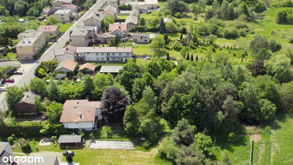 Działka pod budowę domu w zielonej okolicy .