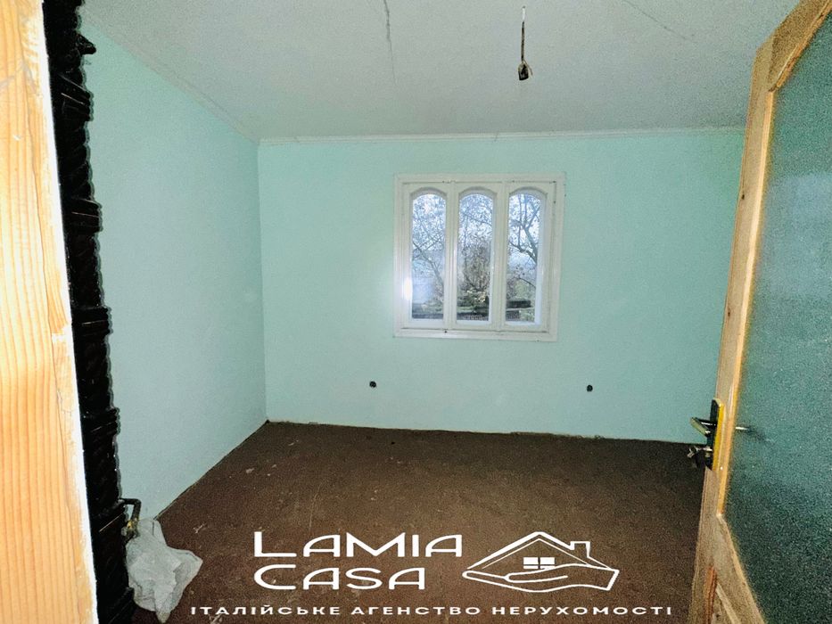 Продаж будиночка в Мигово з ділянкою