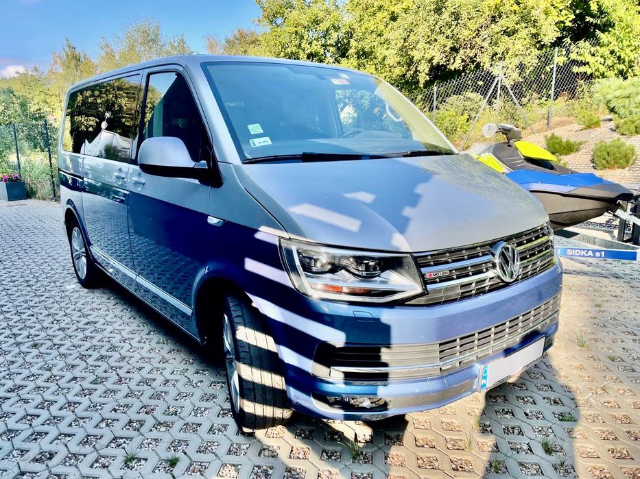 Wynajem BUS 7 osób Volkswagen Multivan Lux Exclusive Dach Moc 204 4x4motion Hak przewóz osób