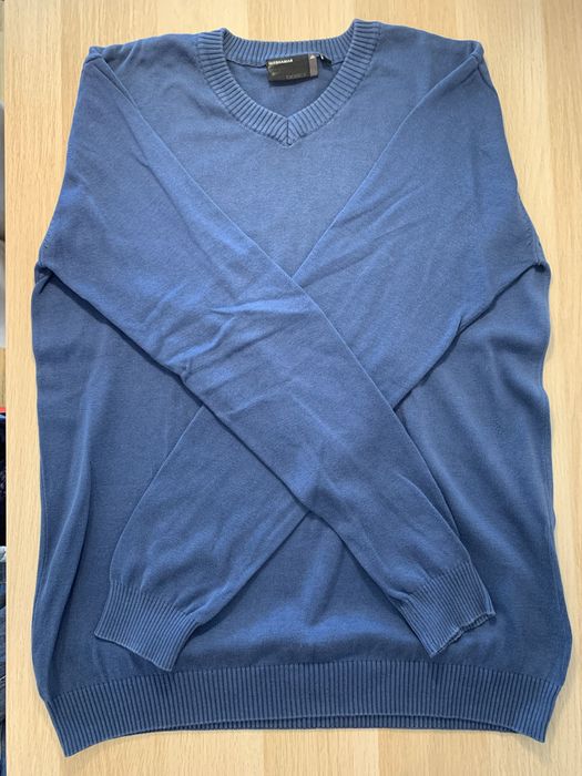 Homem camisola de malha da quebramar