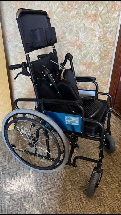 Новая инвалидная коляска.