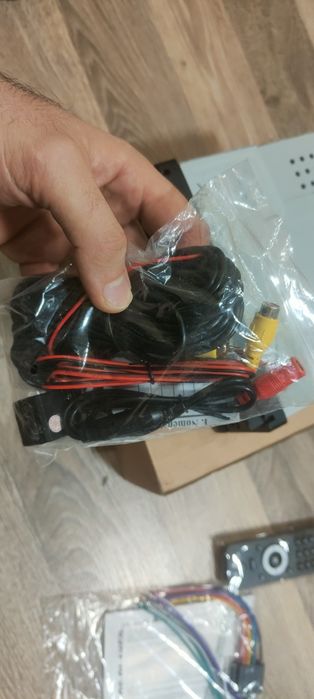 Автомагнітола 1 DIN з висувним 7" екраном + камера заднього виду