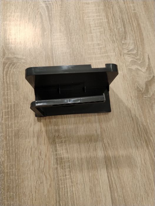 Uchwyt na papier toaletowy z półką na telefon