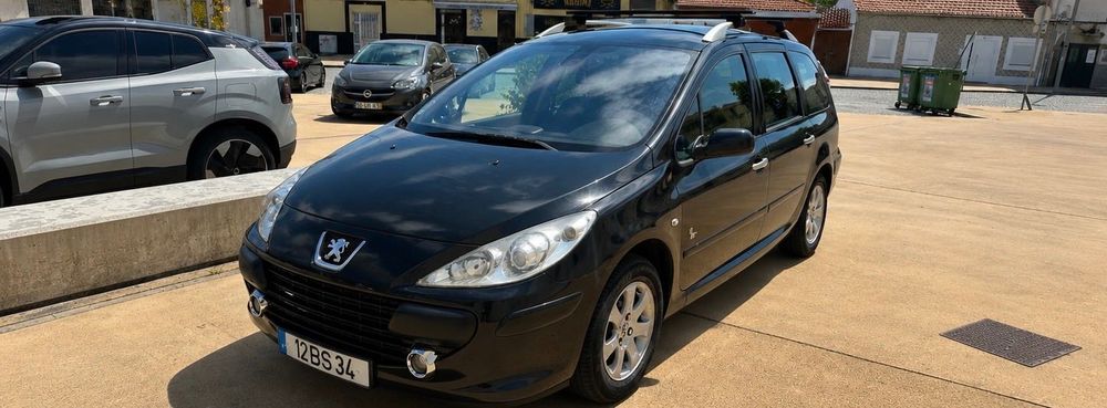 Peugeot 307 SW Diesel • 7 Lugares • Teto Panorâmico