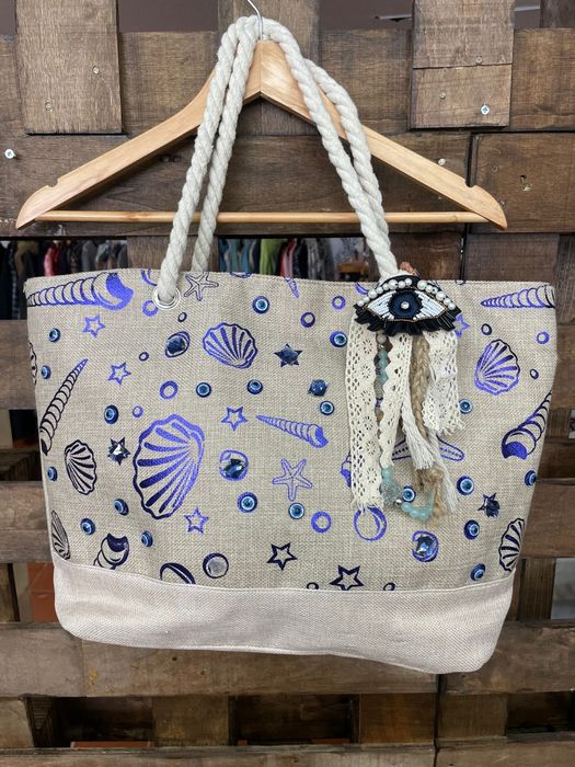 Bolsa rústica com bordado em Olho Grego