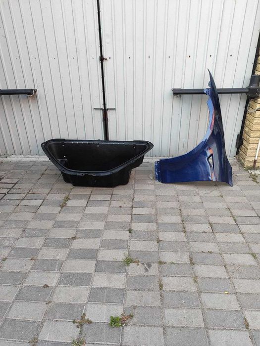 Tesla model S фари бампер підсилювач телевізор радіатори