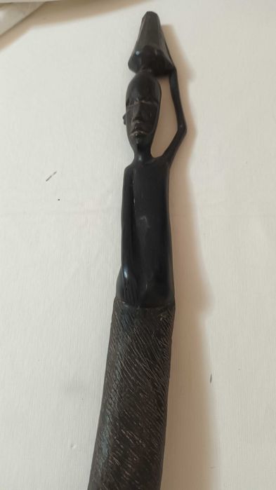 1 estatueta  com 2 imagens