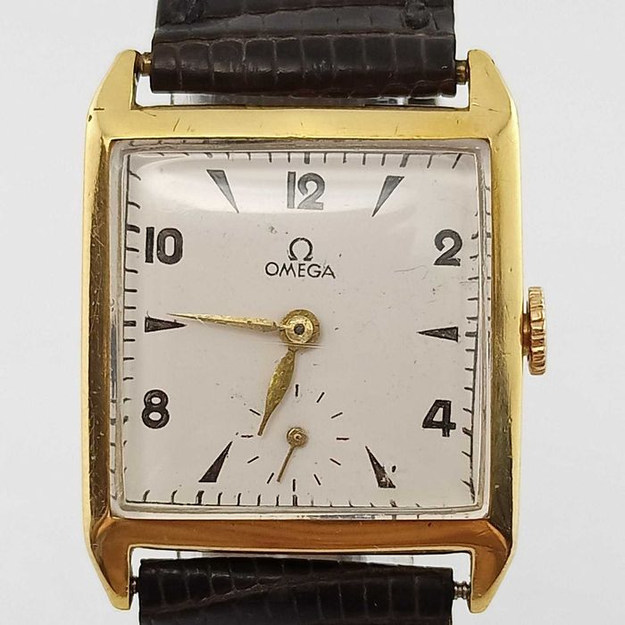 złoty zegarek omega 18k