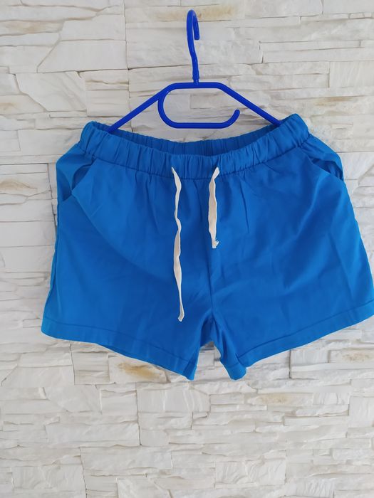 Nowe niebieskie spodenki kieszonki 38/40