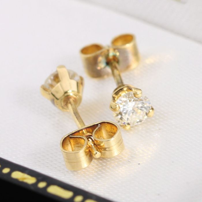 Złote kolczyki. brylantami 0.42ct ponadczasowe 18K