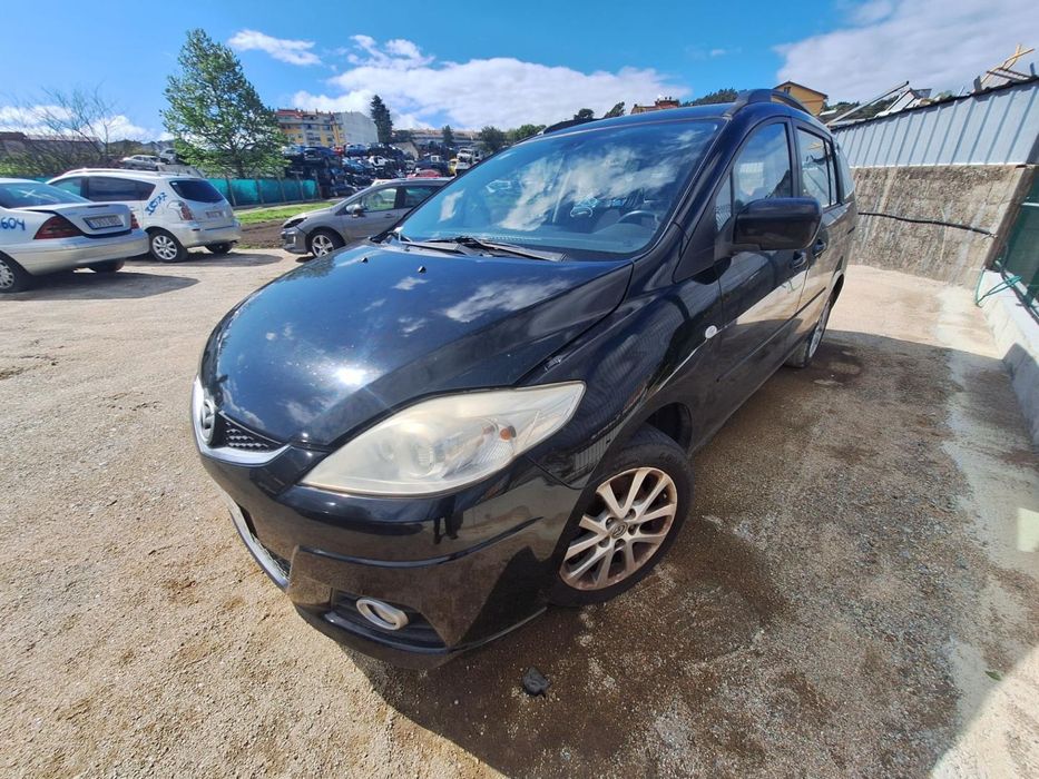 Farol Esquerdo Mazda 5