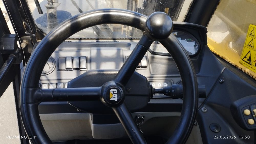 Продам телескопический погрузчик cat 407 c