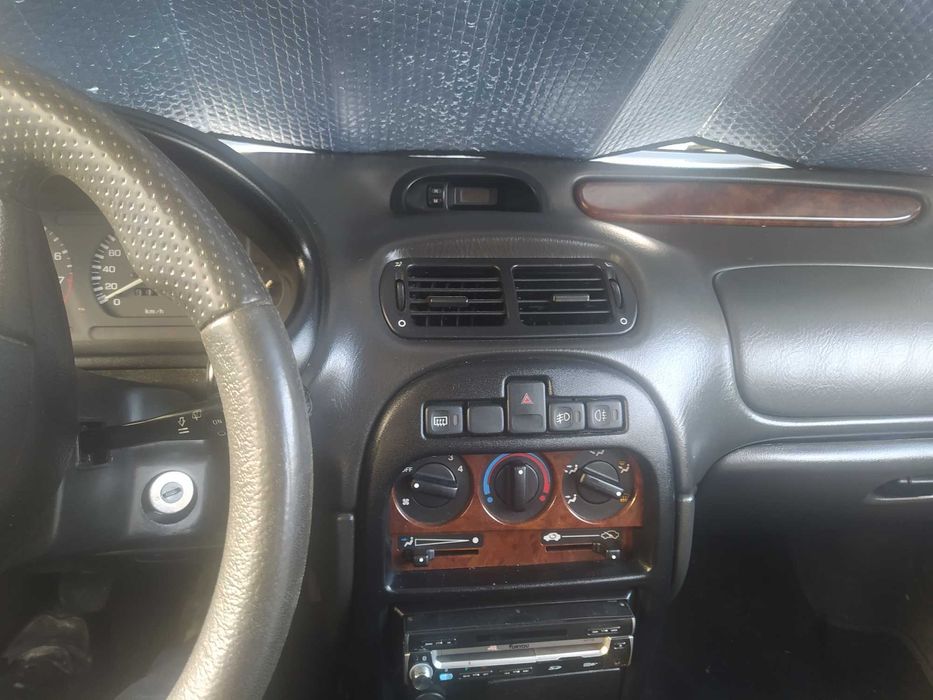 Rover 214 a gasolina com 101,92cv com avaria .