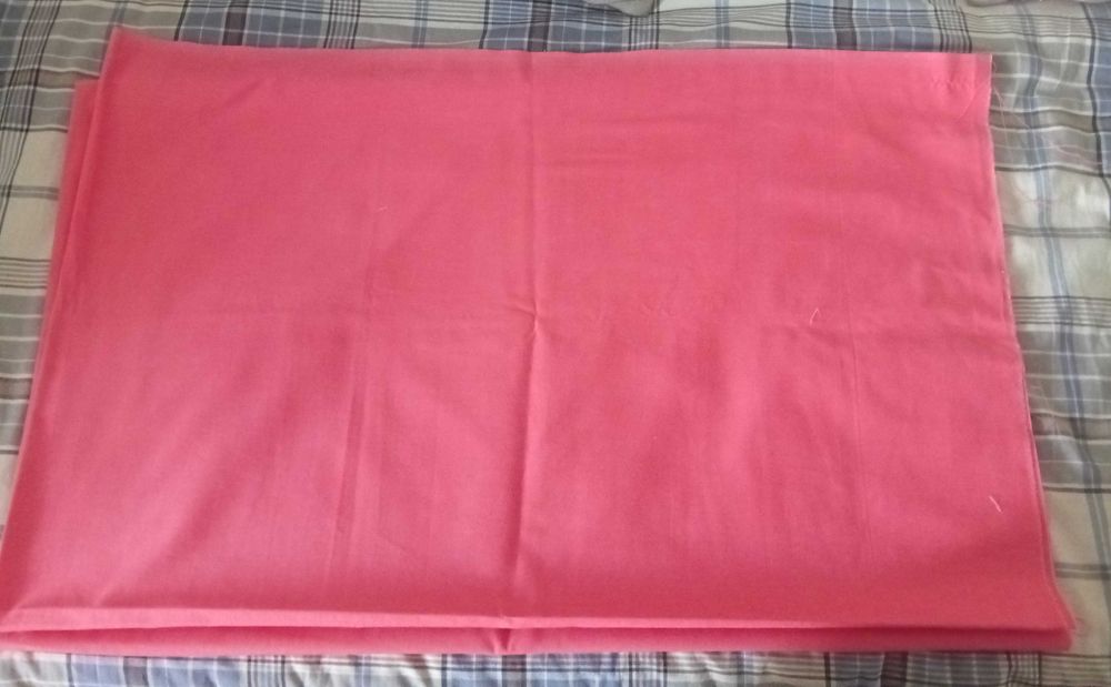 Tecido em cor de laranja/ salmão