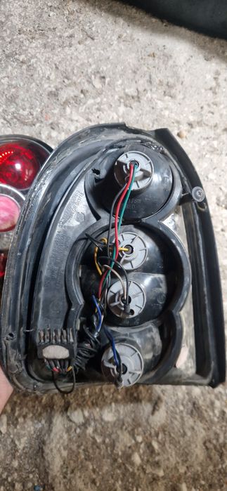 Farolins traz opel corsa b