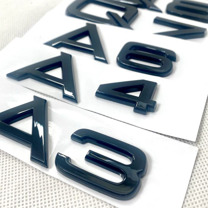 Emblematy Audi Czarny Połysk Znaczki A1 A3 A4 A5 A6 A7 Q3 Q5 Q7 S Line