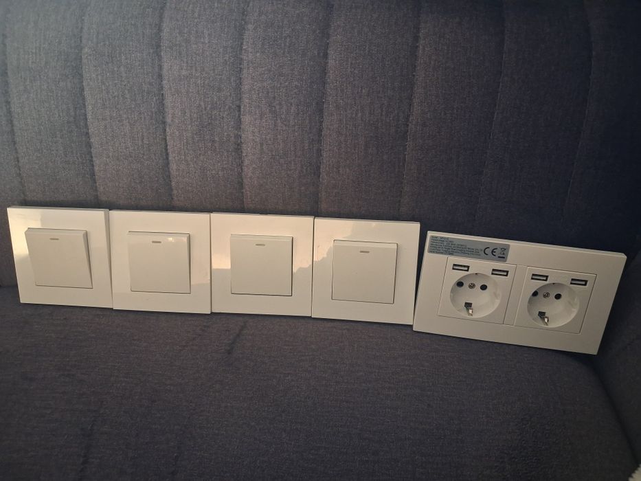 Białe włączniki i podwójne gniazdko z USB