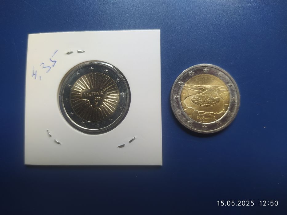 Обмен 2 евро на 2 евро.