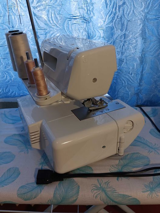 Оверлок Jaguar GT 970 новый