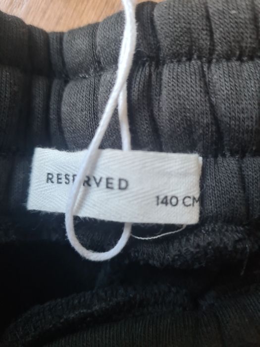 Spodnie Reserved roz 140