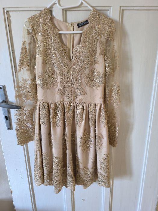Piękna złota sukienka r 38