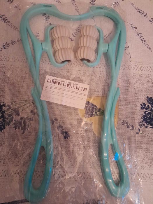 Masażer szyi ramion pleców.