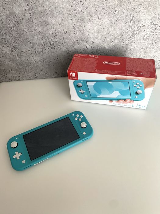 Nintendo Switch Lite 32 Gb o kolorze turkusowym, oryginalne pudełko + ładowarka